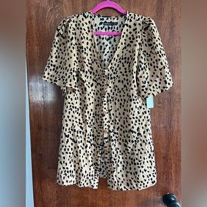 Tan and black spotted button down shirt